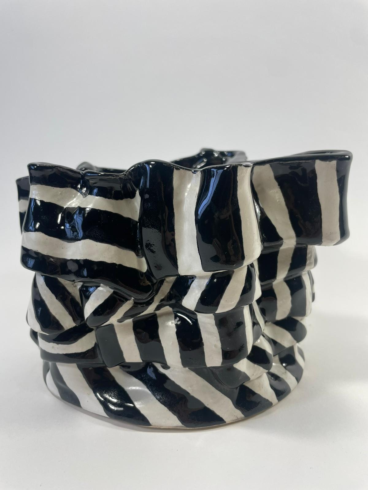 Deception — hand-built ceramic by Grace Ahern
